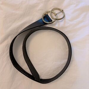 Black leather belt with brass hardware